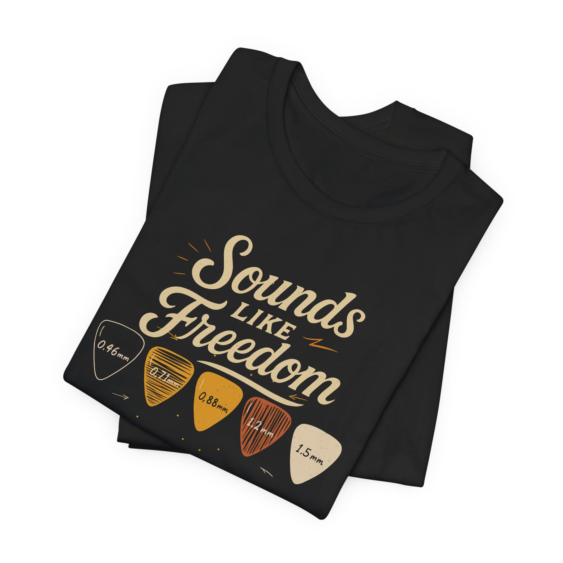 Black Sounds Like Freedom t-shirt with authentic guitar pick design and thickness measurements