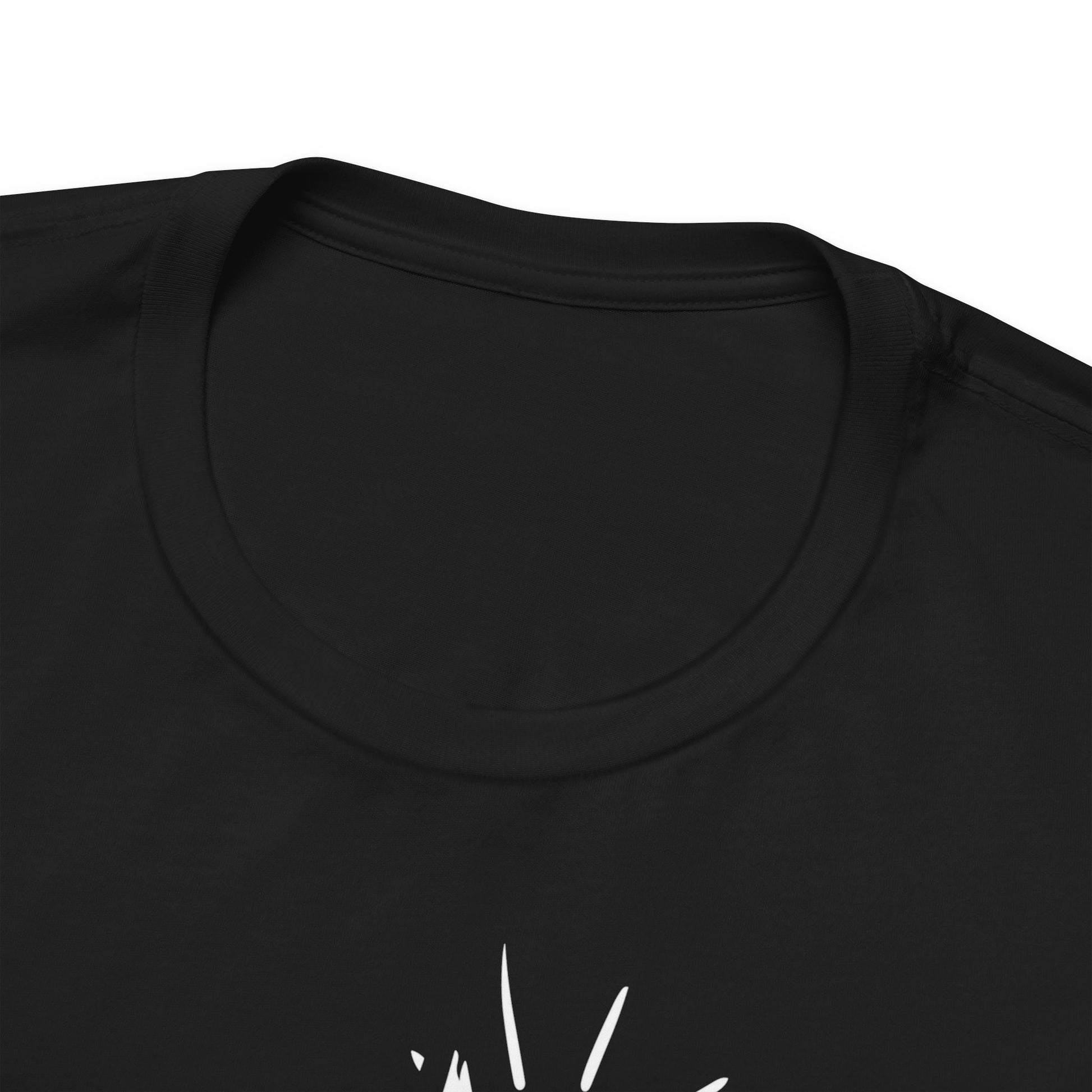 Close-up of a black t-shirt with a white graphic design on a white background