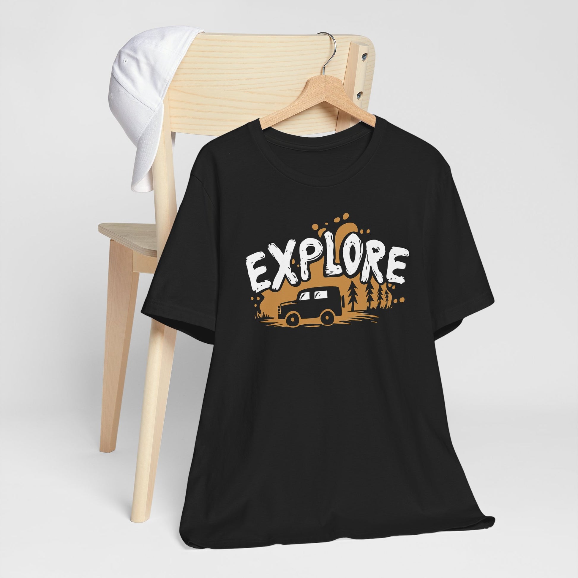 Black Explore t-shirt with adventure vehicle golden forest and pine trees design