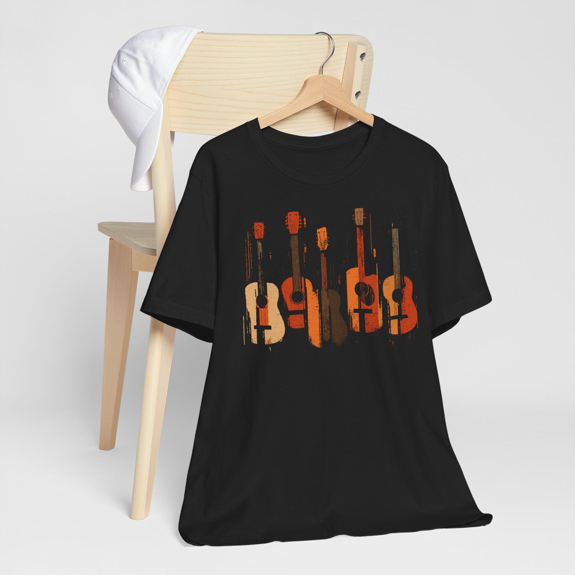 Black Acoustic Heritage t-shirt with five vintage acoustic guitars in warm earth tones