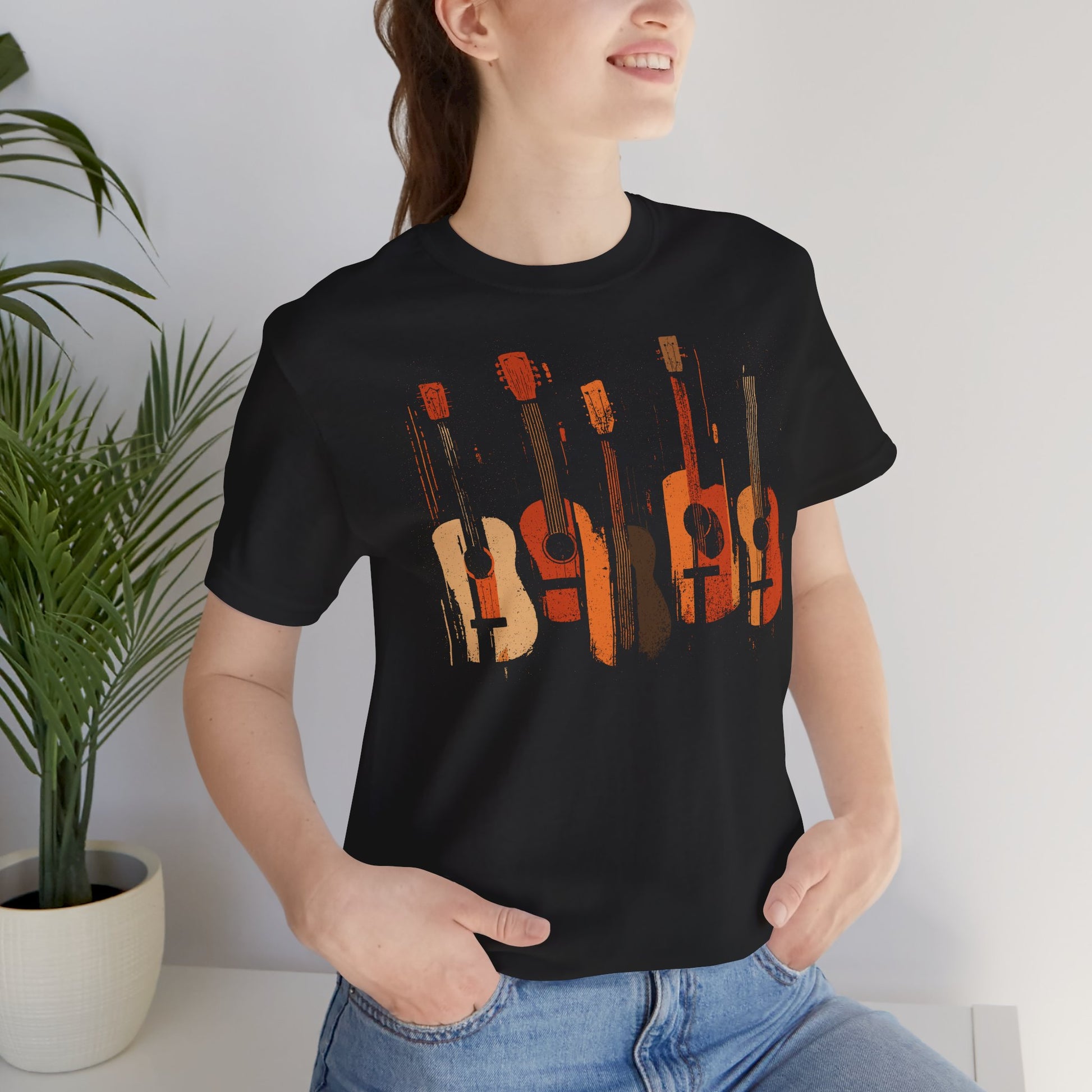 Black Acoustic Heritage t-shirt with five vintage acoustic guitars in warm earth tones