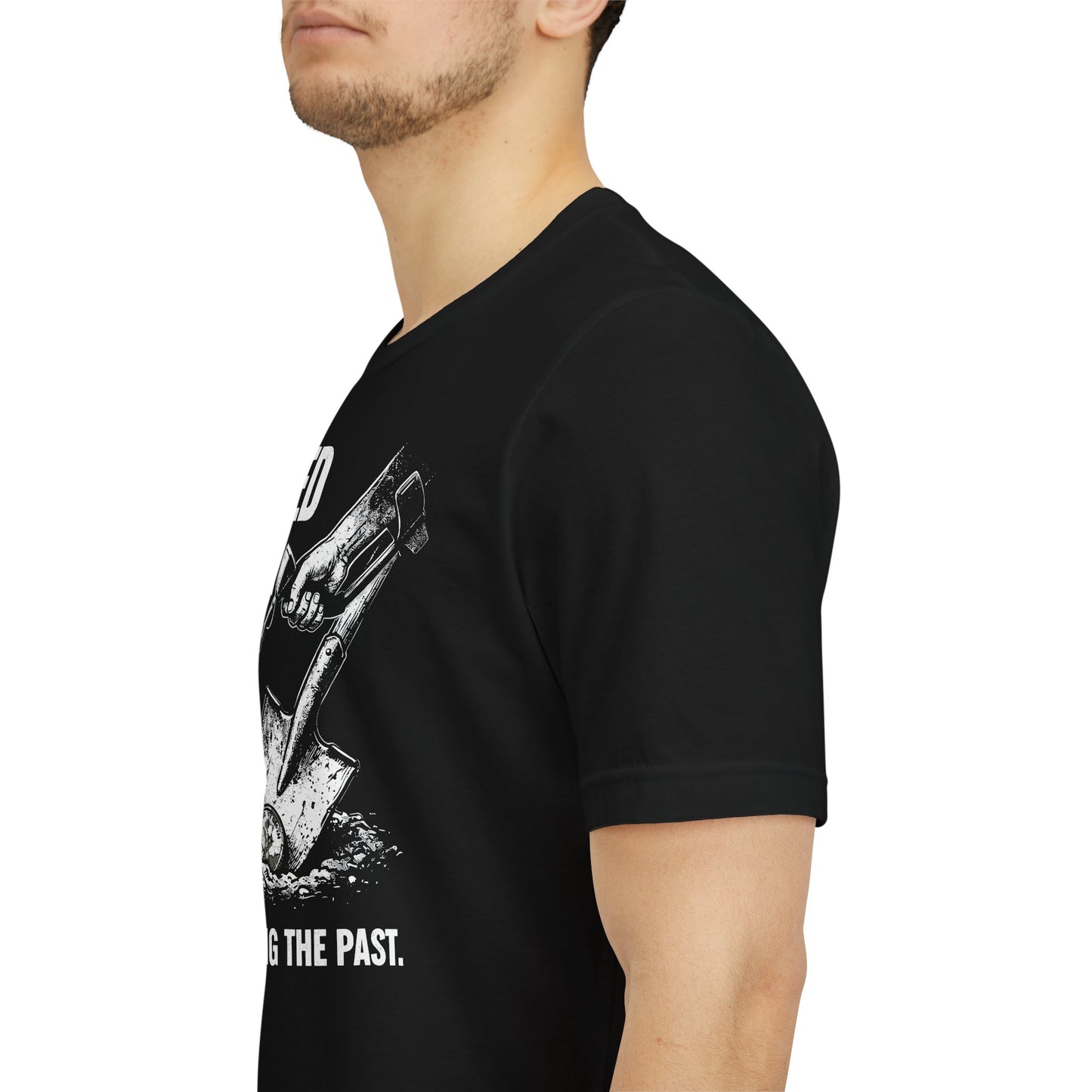 Black t-shirt with graphic design and text worn by a person on a white background