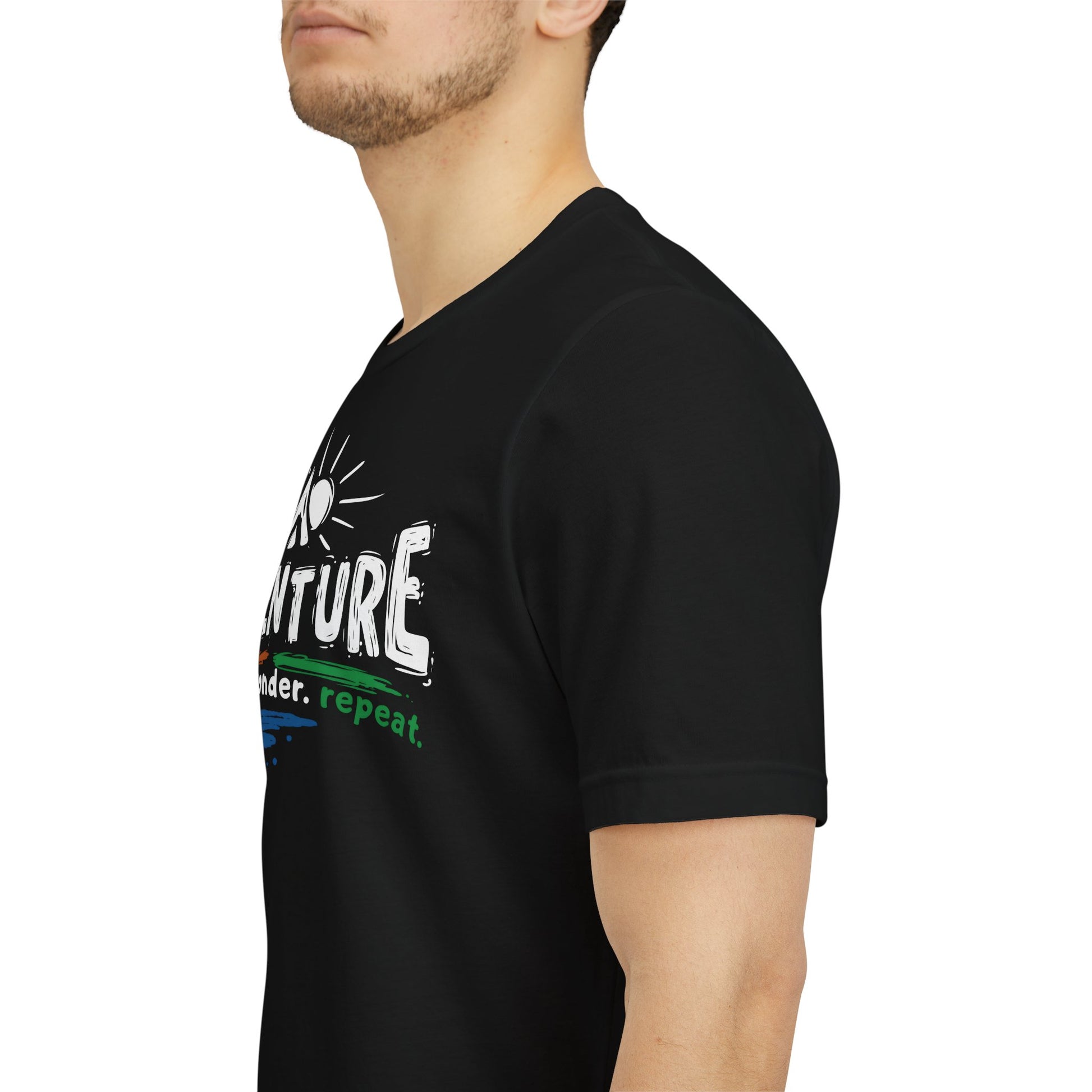 Person wearing a black t-shirt with text and graphics on a white background