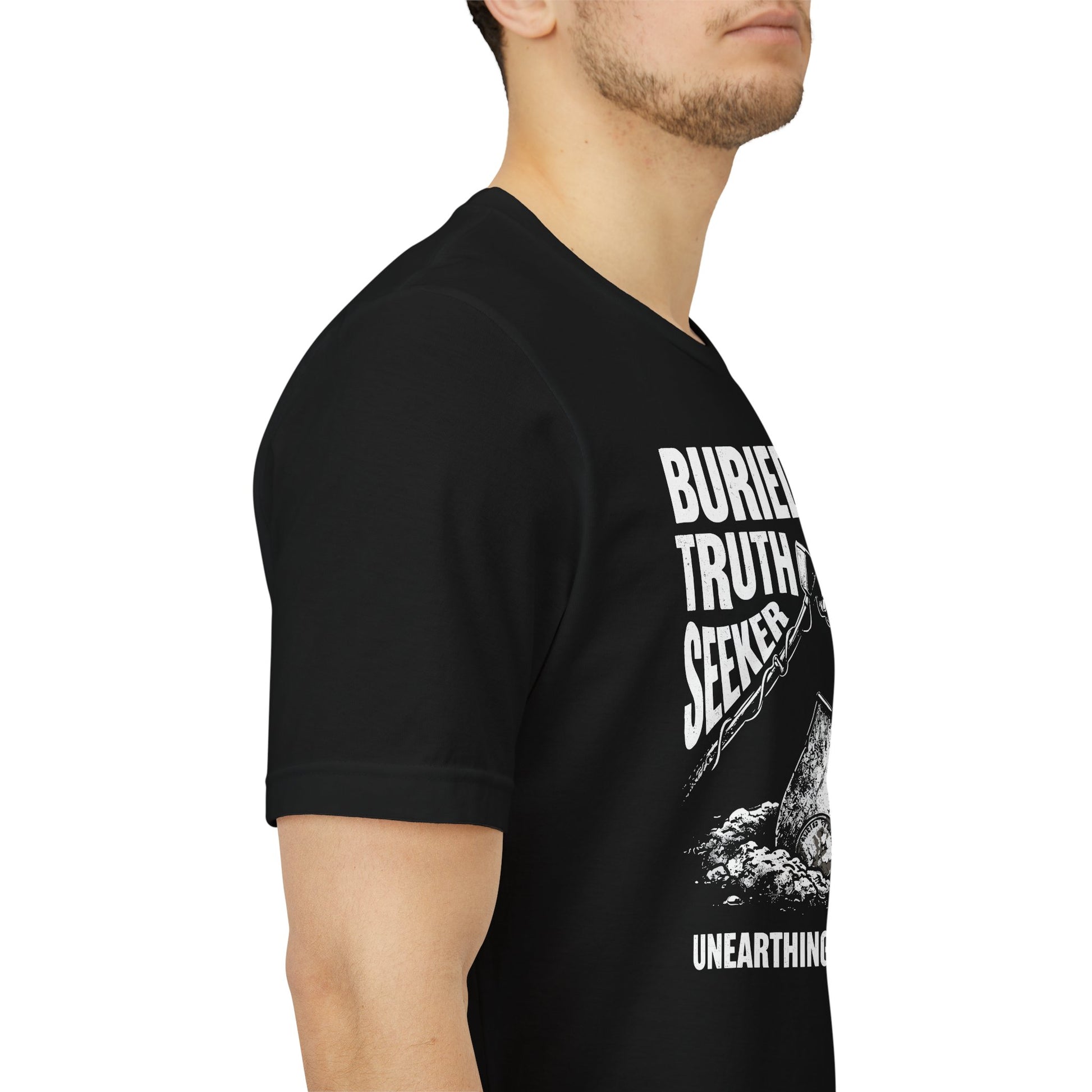 Person wearing a black t-shirt with white text and graphics on a white background