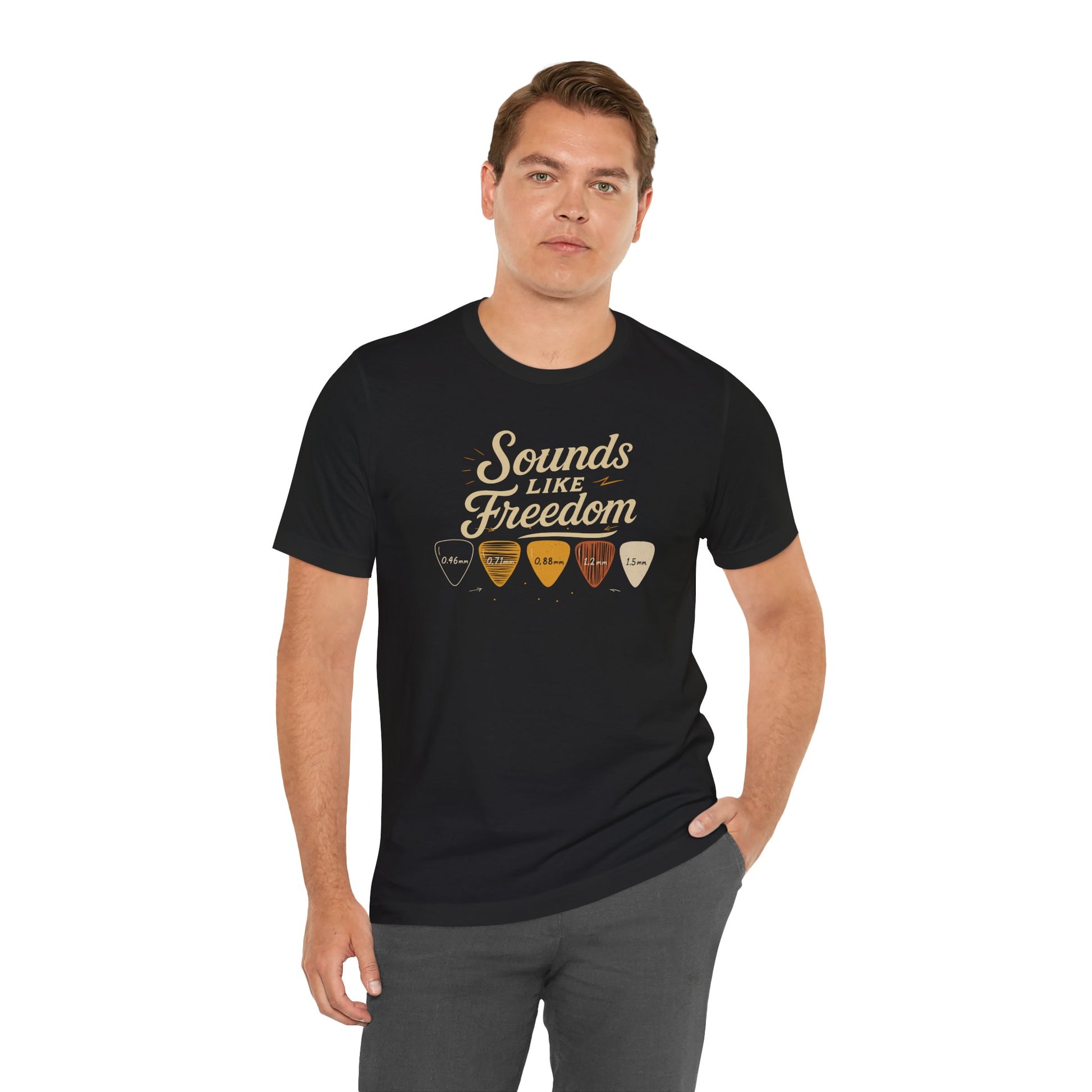 Black Sounds Like Freedom t-shirt with authentic guitar pick design and thickness measurements