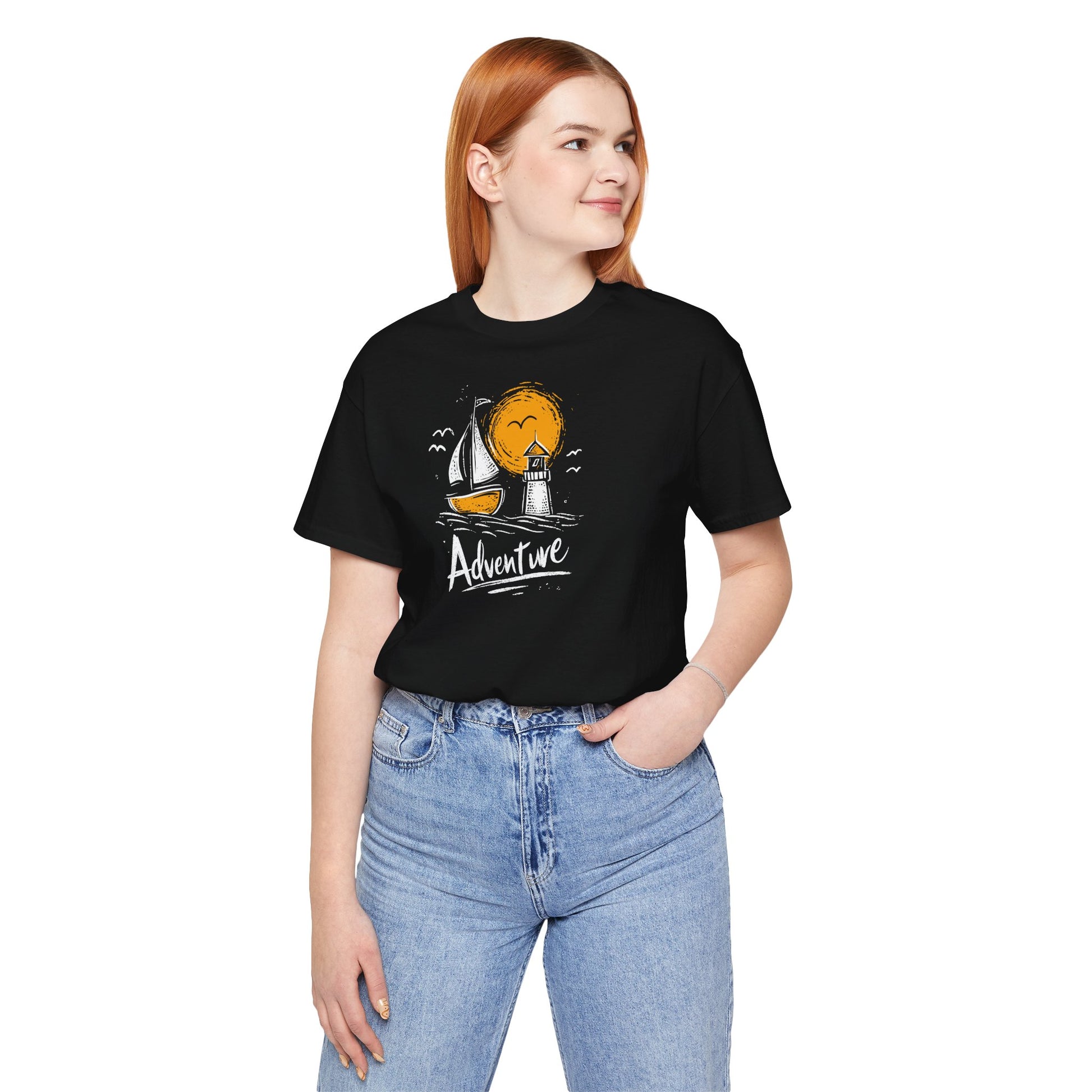 Black Adventure t-shirt with hand-drawn sailboat lighthouse and golden sun nautical design