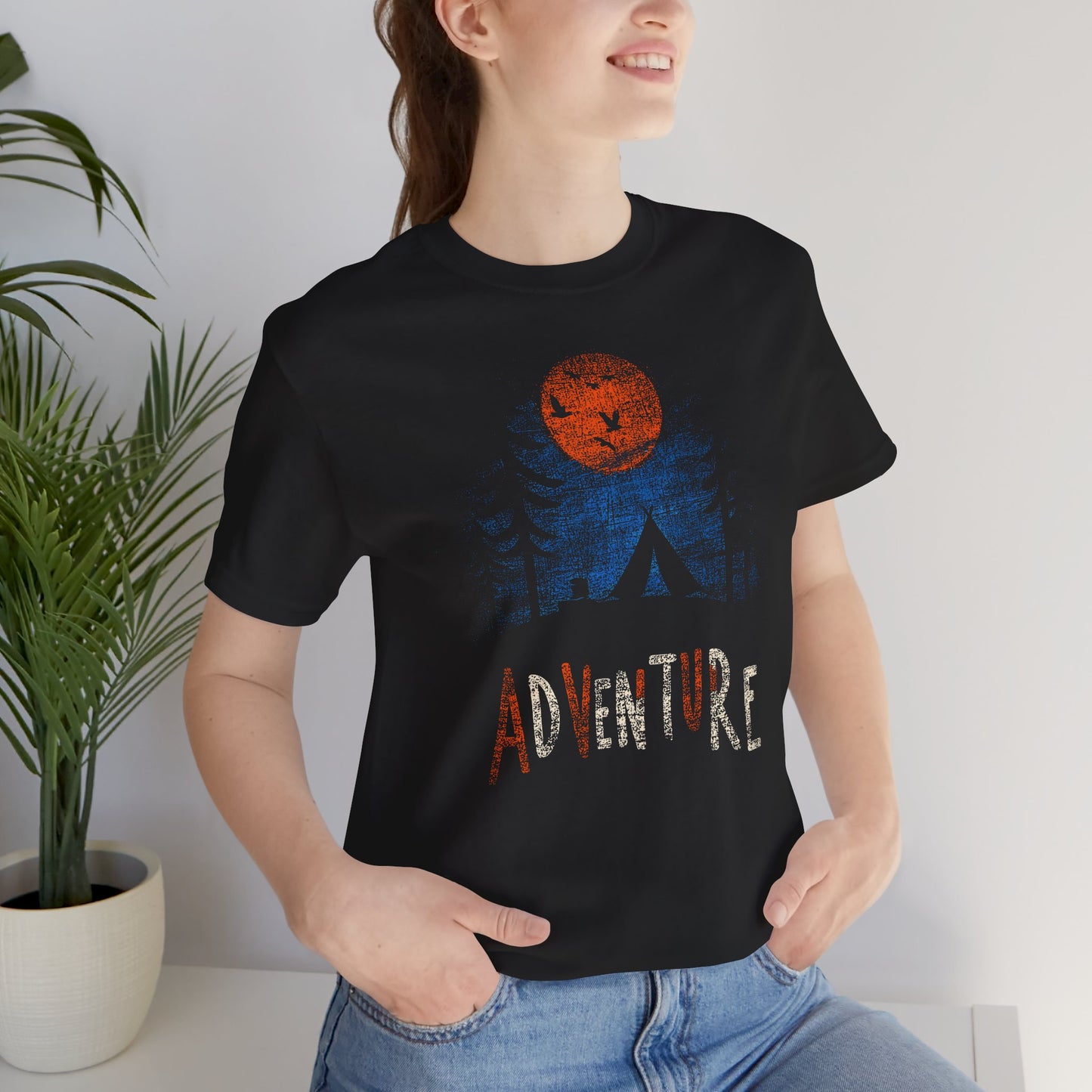 Black Adventure Wilderness t-shirt with orange harvest moon tent and forest camping design