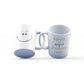 White 11oz ceramic mug showing both sides - hand-drawn smiley daisy flower and Your Smile Brightens The Day quote in blue script